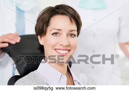 Woman in dentists office View Large Photo Image Stock Image - Woman in dentists office. Fotosearch