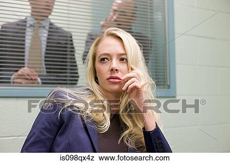 Stock Photo - Woman in interview room. Fotosearch