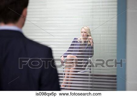 Stock Photography - Woman in interview room. Fotosearch