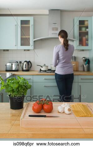 Woman in kitchen View Large Photo Image Stock Photography - Woman in kitchen. Fotosearch