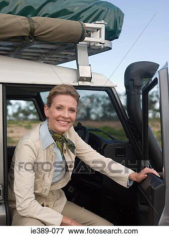 Stock Photo - Woman on safari. Fotosearch