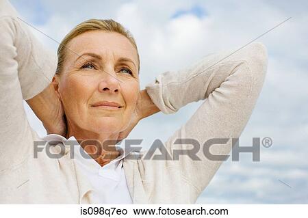 Picture - Woman outdoors. Fotosearch