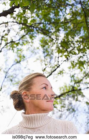 Woman outdoors View Large Photo Image Stock Image - Woman outdoors. Fotosearch