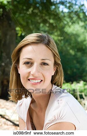 Woman outdoors View Large Photo Image Stock Image - Woman outdoors. Fotosearch