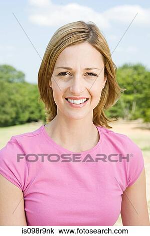 Stock Image - Woman outdoors. Fotosearch