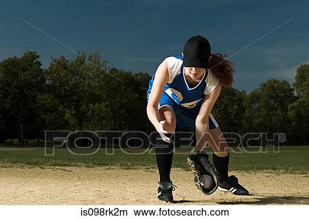 Picture - Woman playing baseball. Fotosearch