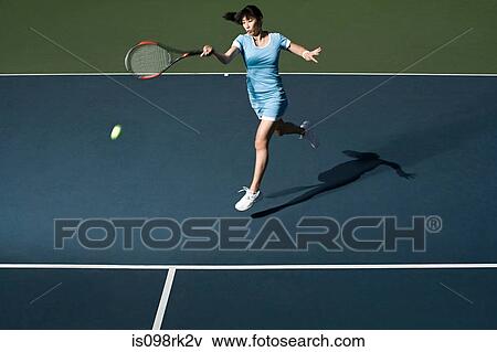 Woman playing tennis View Large Photo Image Stock Photo - Woman playing tennis. Fotosearch