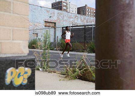 Woman running in brooklyn View Large Photo Image Stock Photo - Woman running in brooklyn. Fotosearch