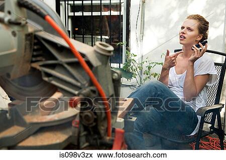 Stock Photo - Woman using smartphone. Fotosearch