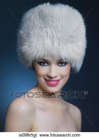 Woman wearing fur hat View Large Photo Image Stock Photograph - Woman wearing fur hat. Fotosearch