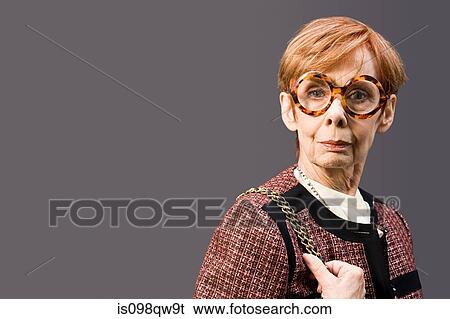 Stock Photograph - Woman wearing large eyeglasses. Fotosearch