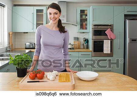 Stock Photograph - Woman with ingredients. Fotosearch