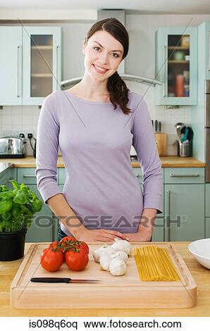 Woman with ingredients View Large Photo Image Stock Photography - Woman with ingredients. Fotosearch