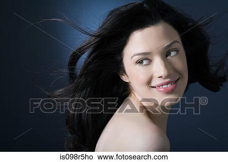 Picture - Woman with movement in hair. Fotosearch