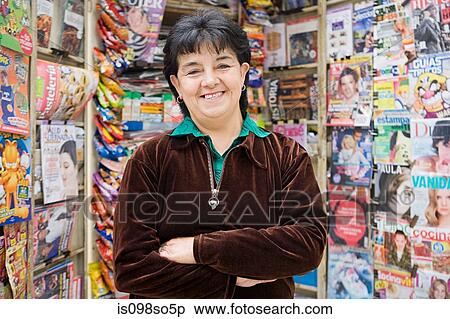 Woman working at newsstand View Large Photo Image Stock Photography - Woman working at newsstand. Fotosearch