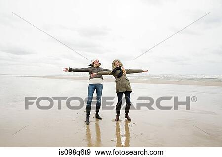 Women at the beach View Large Photo Image Stock Photo - Women at the beach. Fotosearch