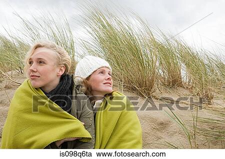 Stock Image - Women at the coast. Fotosearch