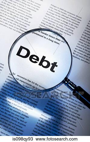 Stock Image - Word debt under magnifying glass. Fotosearch
