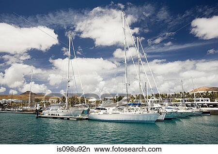 Yachts in Puerto Calero marina, Lanzarote View Large Photo Image Picture - Yachts in Puerto Calero marina, Lanzarote. Fotosearch