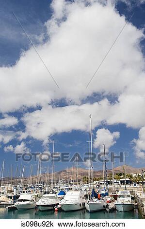 Yachts in Puerto Calero marina, Lanzarote View Large Photo Image Stock Image - Yachts in Puerto Calero marina, Lanzarote. Fotosearch