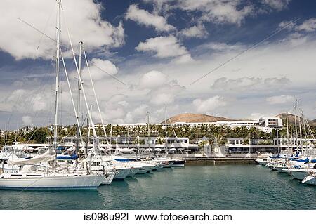 Yachts in Puerto Calero marina, Lanzarote View Large Photo Image Stock Image - Yachts in Puerto Calero marina, Lanzarote. Fotosearch