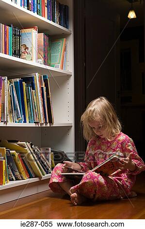 Stock Photography - Young girl reading. Fotosearch