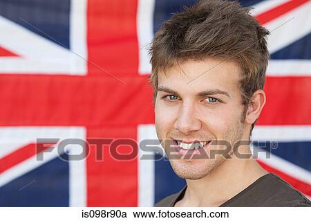 Young man and british flag View Large Photo Image Stock Image - Young man and british flag. Fotosearch