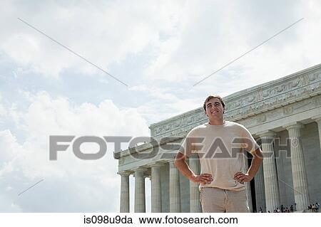Stock Image - Young man at lincoln memorial. Fotosearch