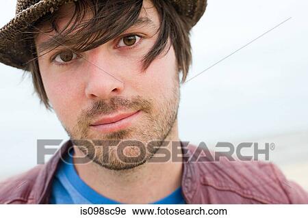 Young man outdoors View Large Photo Image Stock Image - Young man outdoors. Fotosearch