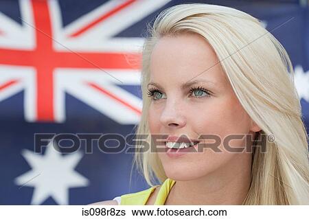 Stock Photograph - Young woman and australian flag. Fotosearch