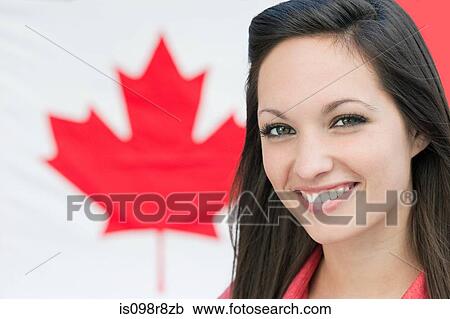 Young woman and canadian flag View Large Photo Image Stock Image - Young woman and canadian flag. Fotosearch