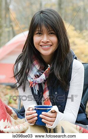 Young woman camping View Large Photo Image Stock Image - Young woman camping. Fotosearch
