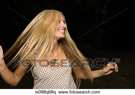 Stock Photography - Young woman dancing. Fotosearch