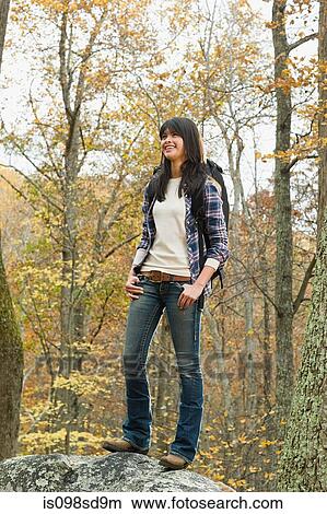 Young woman in forest View Large Photo Image Picture - Young woman in forest. Fotosearch