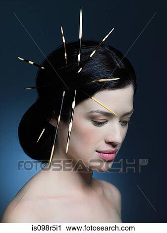 Young woman with porcupine quills in hair View Large Photo Image Stock Image - Young woman with porcupine quills in hair. Fotosearch
