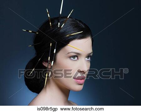 Young woman with porcupine quills in hair View Large Photo Image Stock Photography - Young woman with porcupine quills in hair. Fotosearch
