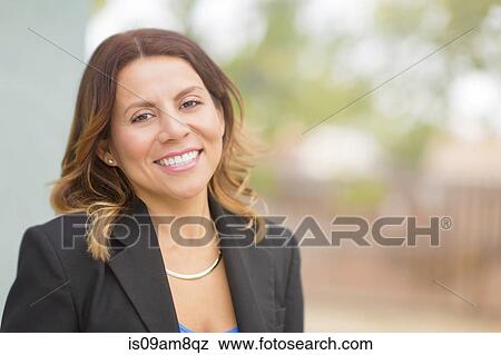 Stock Photo - Business woman smiling. Fotosearch