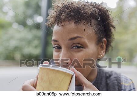 Close up portrait of mature woman drinking takeaway coffee in park View Large Photo Image Stock Photography - Close up portrait of mature woman drinking takeaway coffee in park. Fotosearch