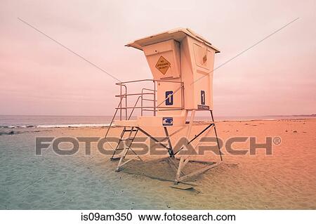 "Coastguard hut on empty beach at sunset, Monterey, California, USA" View Large Photo Image Stock Image - "Coastguard hut on empty beach at sunset, Monterey, California, USA". Fotosearch