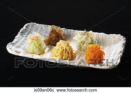Dish with grated vegetable stacks View Large Photo Image Stock Image - Dish with grated vegetable stacks. Fotosearch