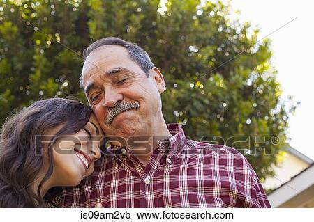Father and daughter sharing tender moment View Large Photo Image Stock Image - Father and daughter sharing tender moment. Fotosearch