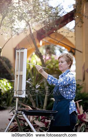 "Female artist painting in Albin Polasek Museum and Sculpture Garden, Winter Park, Florida, USA" View Large Photo Image Picture - "Female artist painting in Albin Polasek Museum and Sculpture Garden, Winter Park, Florida, USA". Fotosearch