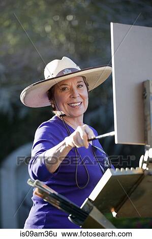 "Female artist painting in Albin Polasek Museum and Sculpture Garden, Winter Park, Florida, USA" View Large Photo Image Stock Photograph - "Female artist painting in Albin Polasek Museum and Sculpture Garden, Winter Park, Florida, USA". Fotosearch