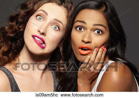 Female models making faces View Large Photo Image Stock Image - Female models making faces. Fotosearch