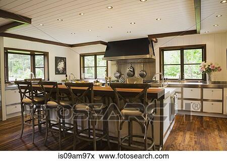 Modern interior design luxury country style kitchen with kitchen island and wooden floor View Large Photo Image Stock Photo - Modern interior design luxury country style kitchen with kitchen island and wooden floor. Fotosearch