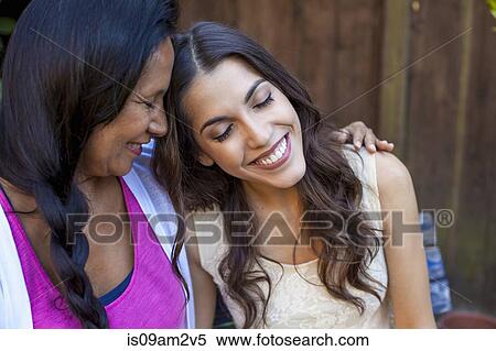 Stock Photography - Mother and daughter sharing tender moment. Fotosearch
