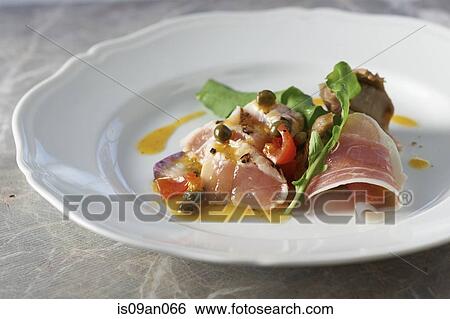 "Plate with sliced ham, peas and rocket garnish" View Large Photo Image Stock Photograph - "Plate with sliced ham, peas and rocket garnish". Fotosearch