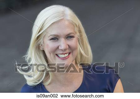 Portrait of attractive mature woman on street View Large Photo Image Stock Image - Portrait of attractive mature woman on street. Fotosearch