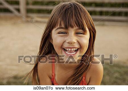 Portrait of laughing girl in farmyard View Large Photo Image Picture - Portrait of laughing girl in farmyard. Fotosearch