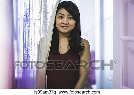 Stock Photography - Portrait of young Asian woman. Fotosearch